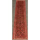 A North-west Persian Malayer runner carpet, 286cm x 77cm.