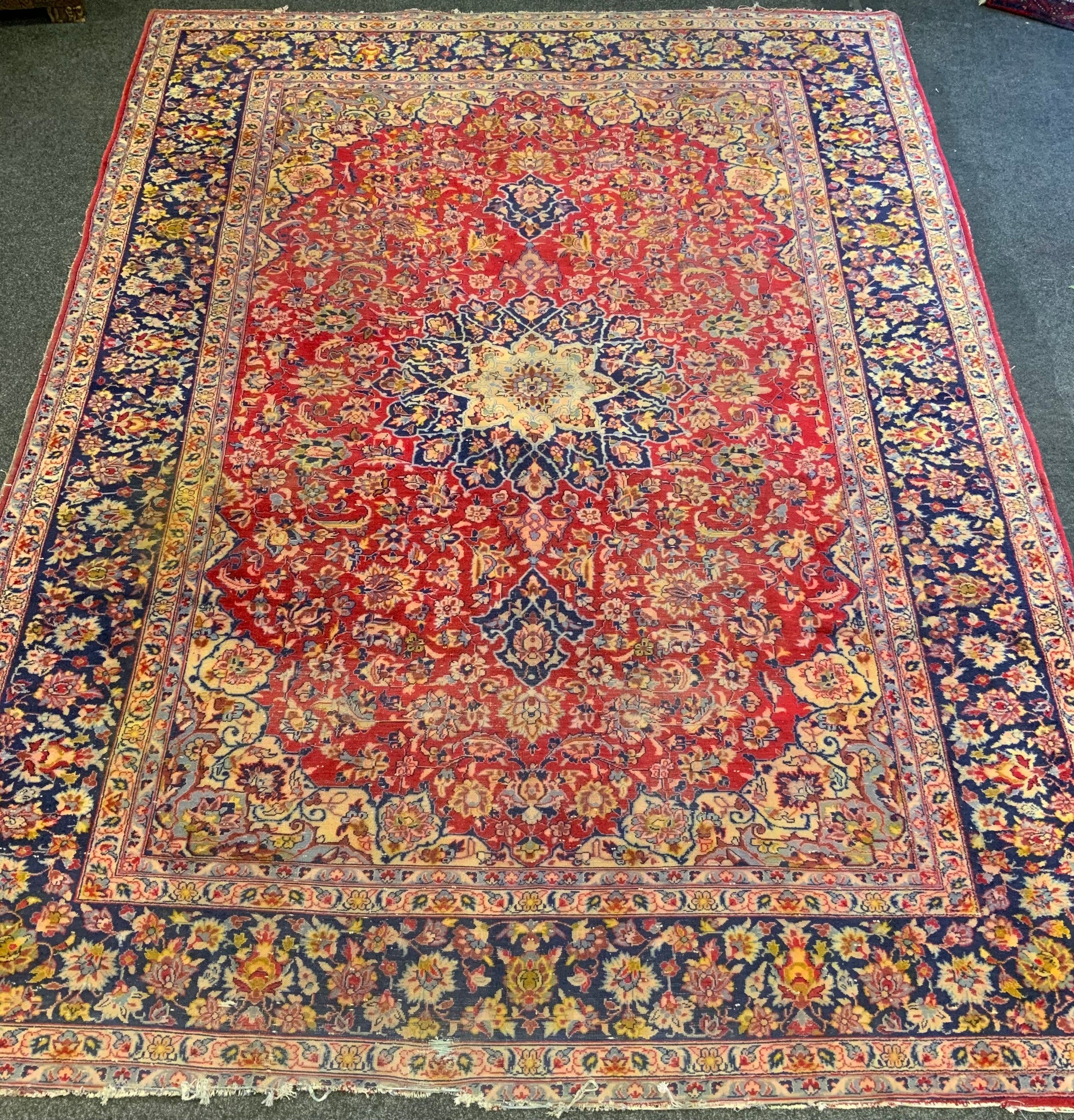 A large Isfaharn rug, approximately 296cm x 385cm