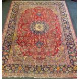 A large Isfaharn rug, approximately 296cm x 385cm
