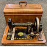 A sewing machine by Victoria c.1890