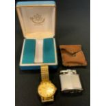 A Swiss Presision AM gold plated cased wristwatch, gilt dial, bold block baton markers, minute