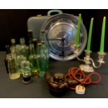 A Mercedes Benz hub cap wall clock; desk weight; advertising bottles etc