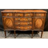 A reproduction Hepplewhite design mahogany sideboard of small proportions, 79cm high x 112cm wide