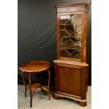 A 19th century mahogany floor-standing corner cabinet, moulded cornice, carved pediment, astral-