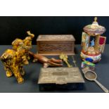 A carved oak box, 1903; crocodile nutcracker, silver plated box; scent bottle ; pair of elephants