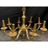 A large brass Dutch style eight branch chandelier, bulbous column, shaped arms, 80cm diameter,