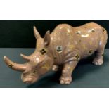 A Reproduction Designer decorated figure of a Rhinoceros