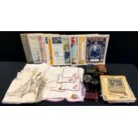 An Ebony desk set; Royal Commemorative coronation guides, magazines etc; lase and embroidered