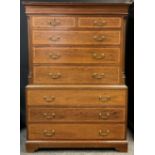 A George III style reproduction mahogany chest on chest, two short above six graduated long drawers,