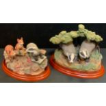 A Border Fine art figure County Characters series, Badgers, Discovery, A1283; another Badger Ball,