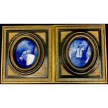 A pair of 19th century style flow blue porcelain plaques, each decorated with children at play, in