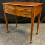 An early 20th century oak Arts and Crafts style canteen side table, serpentine front, pair of