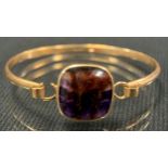 A 9ct gold blue fluorite compression bangle, 12.3g gross