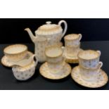 A Spode Fleur de Lys gold pattern tea set, for six inc teapot, six, cups, saucers, side plates,