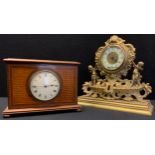 An Edwardian inlaid mahogany mantel clock, cream dial, Roman numerals; a French brass shelf clock,