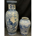 A 20th century Chinese blue and white floor vase, decorated with Pheasants amongst flowering Prunus,