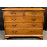 A George III mahogany chest of two short over three graduated long drawers, brass swan-neck handles,