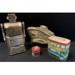 A tin plate battery operated bump and go robot, flashing eyes, 32cm high; Art Deco style ship