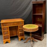 A reproduction Yew, Knee-hole desk, leather inset top, single long drawer to frieze, six small