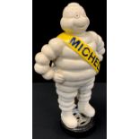 A reproduction cast iron model of Michelin man, 39cm