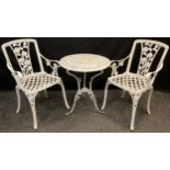 An early 20th century, white painted metal, garden bistro set, comprising small tripod base table,