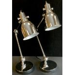 A pair of modern chrome angle poise lamps, 42cm high (2)