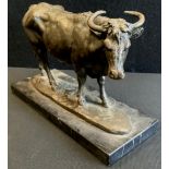 A Bronze model of a bull, signed ‘Milo’, black marble base, 20th century.