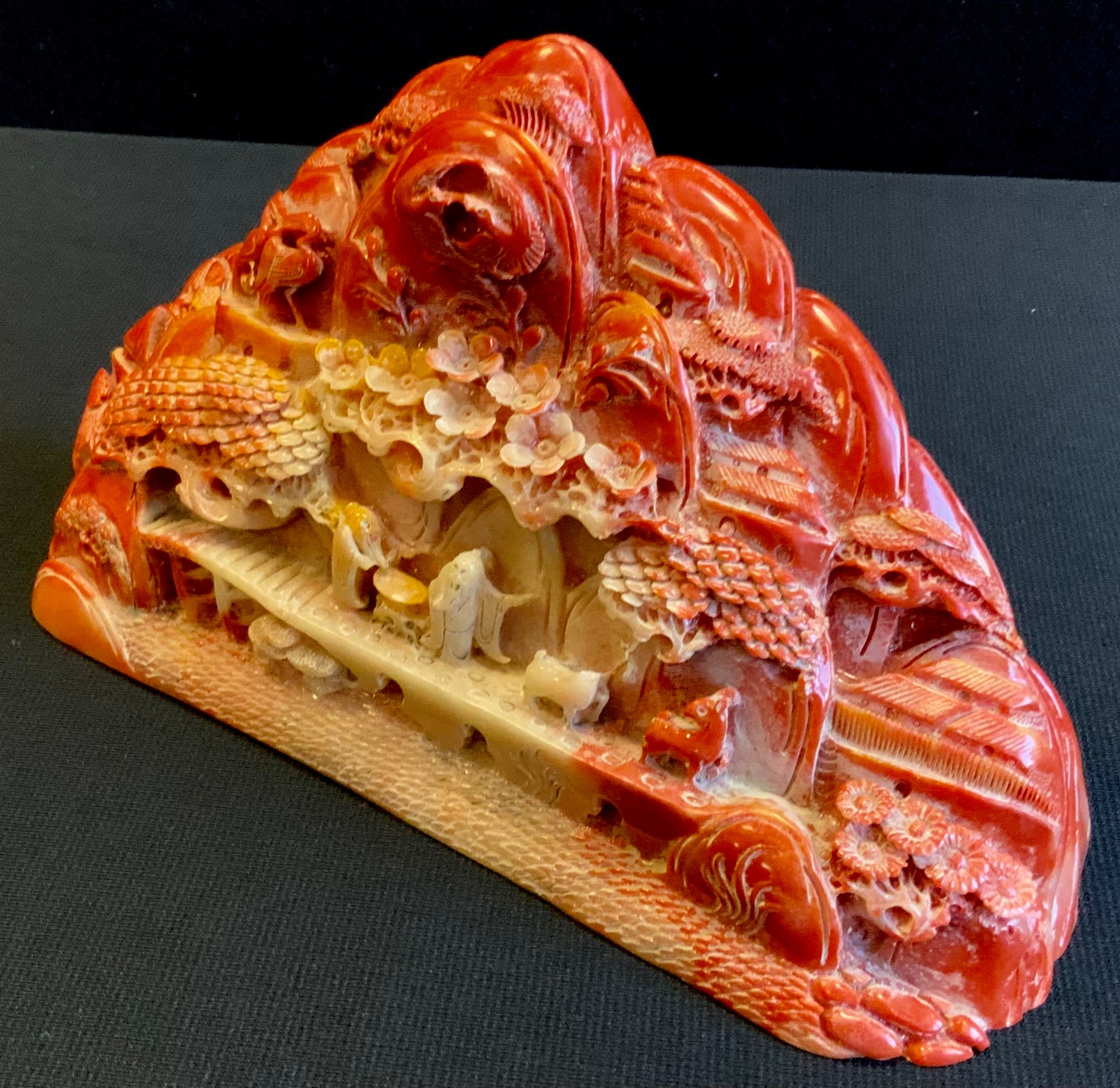 A Chinese red stone carving, as a village, 14cm x 23cm