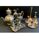 A Victorian Britannia metal chalice and cover, embossed floral motifs; teapots, brass ejector