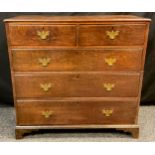 A George III oak chest, two short over three long graduated drawers, brass swan-neck handles,