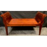 A contemporary mahogany sleigh bench / window seat, 69.5cm high x 127cm wide x 50.5cm deep.