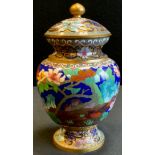 A late 19th /20th century Japanese cloisonné jar and cover, decorated with trailing blossoms, birds,