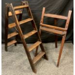 An early Victorian pine step ladder, 121cm high x 37cm wide, c.1860; a 19th century stained pine