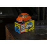 Corgi Toys 233 Heinkel economy car with windows, orange body, lemon yellow interior, cast hubs,