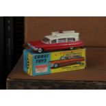 Corgi Toys 437 Superior Ambulance on Cadillac chassis, red and cream body, battery operated roof