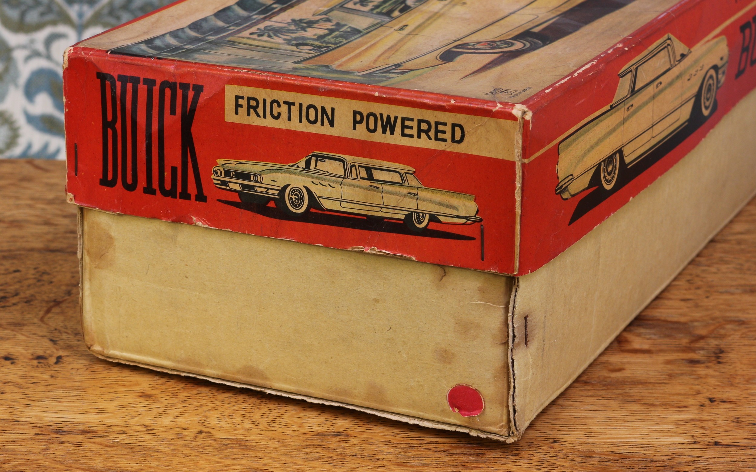 A 1960's Ichiko (Japan) tinplate and friction powered Buick, two tone red and cream body with - Image 3 of 3