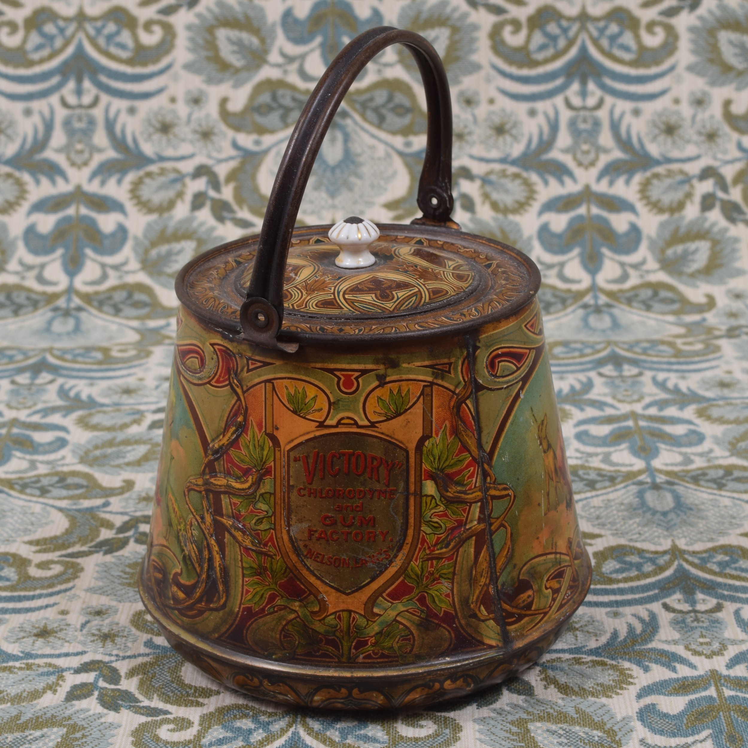 Advertising - an early 20th century pictorial confectionery tin in the form of a biscuit barrel, - Image 2 of 2