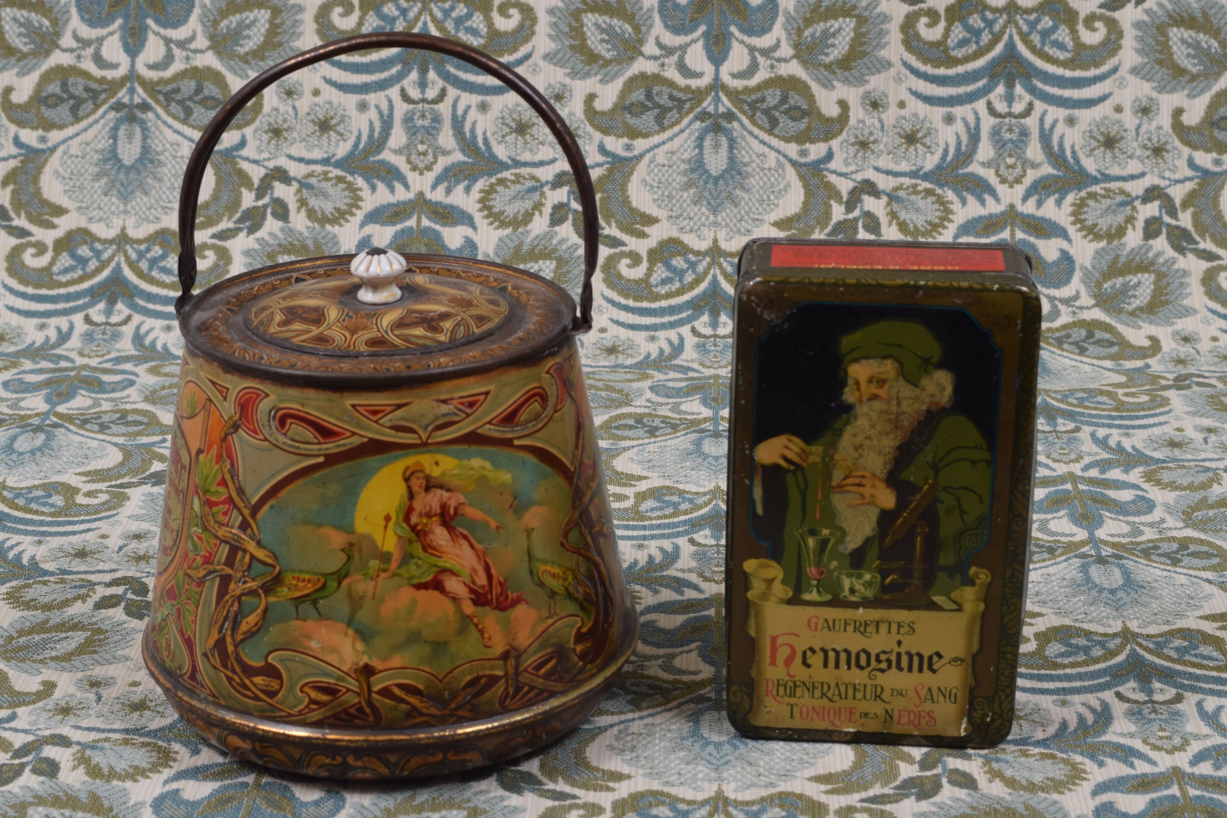 Advertising - an early 20th century pictorial confectionery tin in the form of a biscuit barrel,