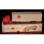 Dinky Supertoys 948 McLean tractor trailer, red cab with windows and decals to side doors,