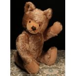 A 1950's Steiff (Germany) brown mohair jointed teddy bear, brown and black plastic eyes,