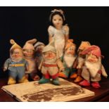 A 1930's set of Chad Valley Snow White and the Seven Dwarfs pressed felt novelty dolls, each with