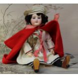 An L.Prieur (France) Mon Cheri bisque head and painted composition ball jointed bodied doll, the