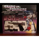 A Hasbro Transformers Decepticon Leader Megatron set, comprising snap-on weapons and accessories,