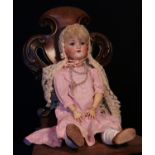 An Armand & Marseille (Germany) bisque head and ball jointed painted composition bodied doll, the