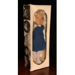 A Trendon Sasha Morgenthaler 115S Sasha blonde doll, wearing a blue and white shirt with blue