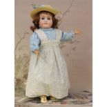 A Limoges (France) bisque head and ball jointed painted composition bodied doll, fixed blue glass