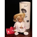 A Götz Sasha Morgenthaler 01 40223 Irka blonde doll, wearing a white dress with white underclothes
