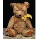 A 1940's/1950's Chiltern 'Hugmee' jointed mohair teddy bear, amber and black glass eyes,