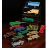 A collection of unboxed Dinky Toys, mostly commercial models, comprising two 25a open wagons, each