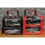 Bburago 1:18 scale Diamond Collection models, comprising Cod.34064 Aston Martin V12 Vanquish, window